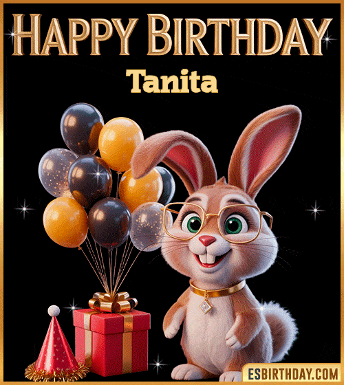Funny happy birthday GIF for Tanita featuring a cute bunny with glasses, festive balloons and a gift box – personalized animated birthday greeting with a playful and joyful vibe